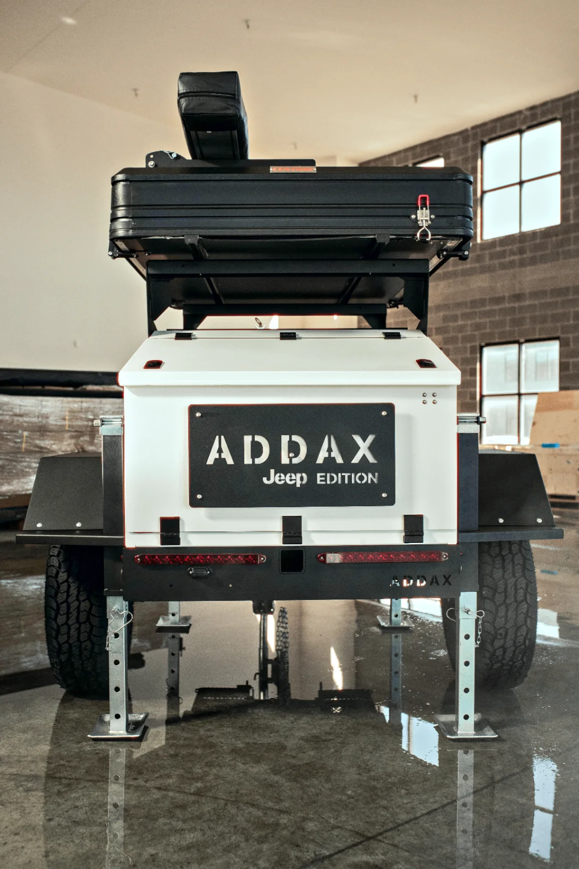 Close detail of lighting and hardware on an ADDAX camper
