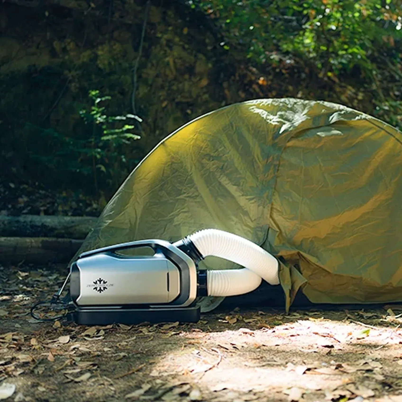 Zero Breeze portable air conditioner outside a backcountry tent