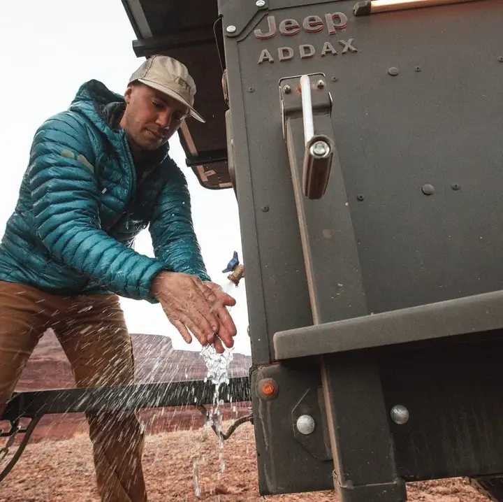 Rinsing off at the trailer