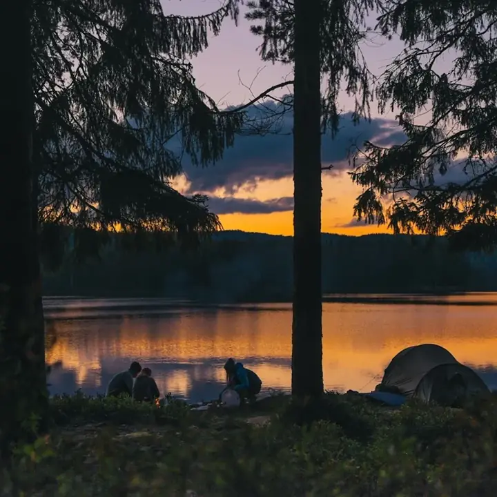 Sunset campfire by the lake